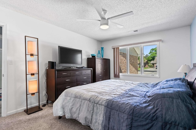 502 Garden Dr, Surfside Beach, SC 29575 - bedroom featuring light carpet, a textured ceiling, ceiling fan, and baseboards