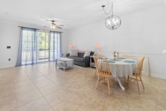 5825 Catalina Dr Unit 124, North Myrtle Beach, SC 29582 - dining area featuring ornamental molding, light tile patterned floors, a chandelier, a ceiling fan, and baseboards