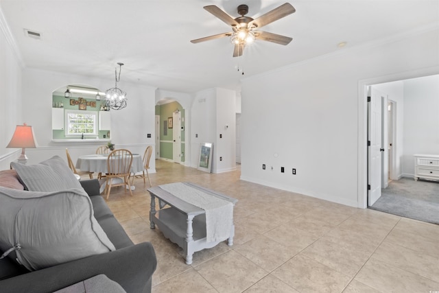 5825 Catalina Dr Unit 124, North Myrtle Beach, SC 29582 - living area featuring arched walkways, a ceiling fan, crown molding, light tile patterned floors, and baseboards