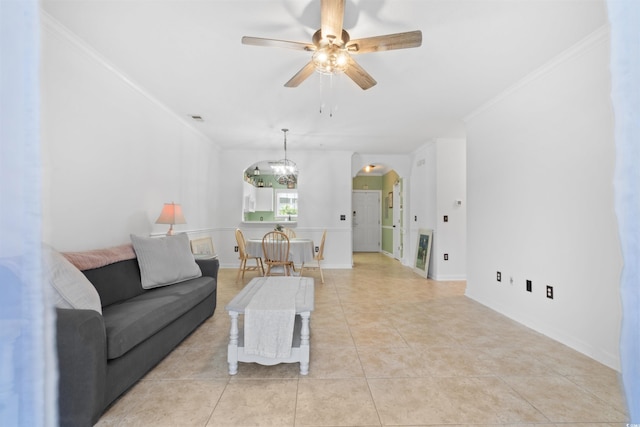 5825 Catalina Dr Unit 124, North Myrtle Beach, SC 29582 - living room with arched walkways, a ceiling fan, light tile patterned floors, baseboards, and a chandelier