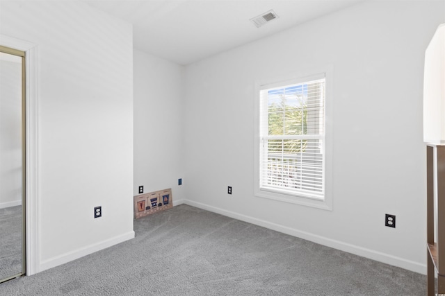 5825 Catalina Dr Unit 124, North Myrtle Beach, SC 29582 - carpeted spare room featuring baseboards