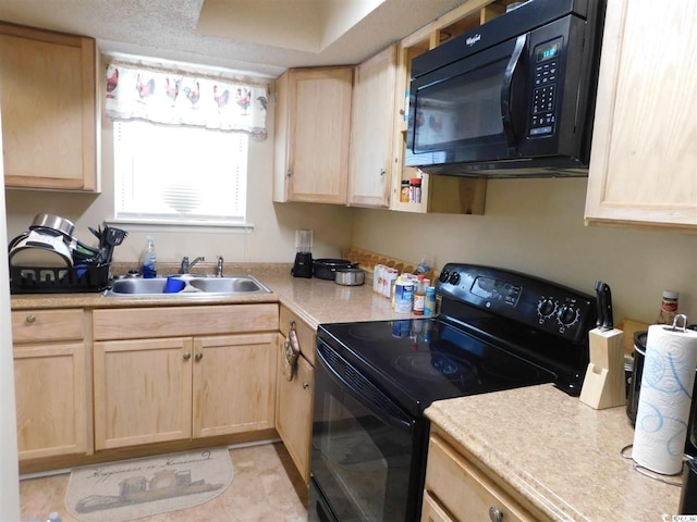 6805 Creekwatch Rd Unit 105, Myrtle Beach, SC 29588 - kitchen featuring black appliances, light brown cabinets, a sink, and light countertops
