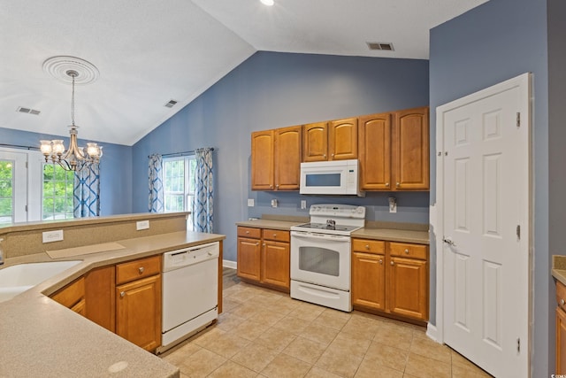 1033 Mccall Loop, Conway, SC 29526 - kitchen featuring white appliances, a chandelier, decorative light fixtures, a sink, and light countertops