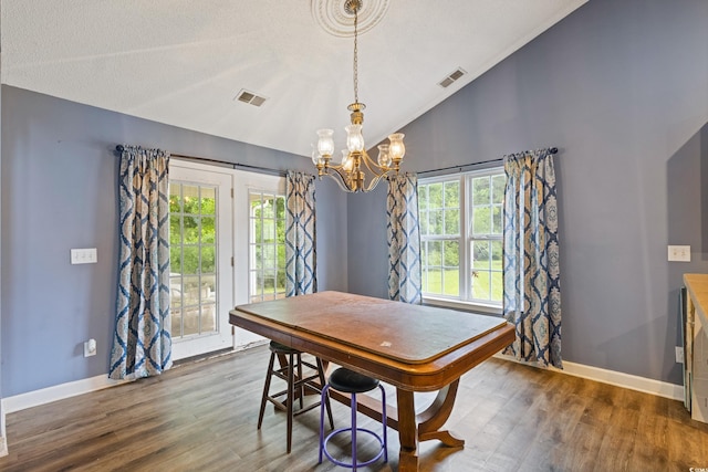 1033 Mccall Loop, Conway, SC 29526 - dining area featuring vaulted ceiling, a chandelier, wood finished floors, healthy amount of natural light, and baseboards