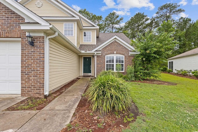 1033 Mccall Loop, Conway, SC 29526 - doorway to property featuring brick siding, a lawn, an attached garage, and a shingled roof