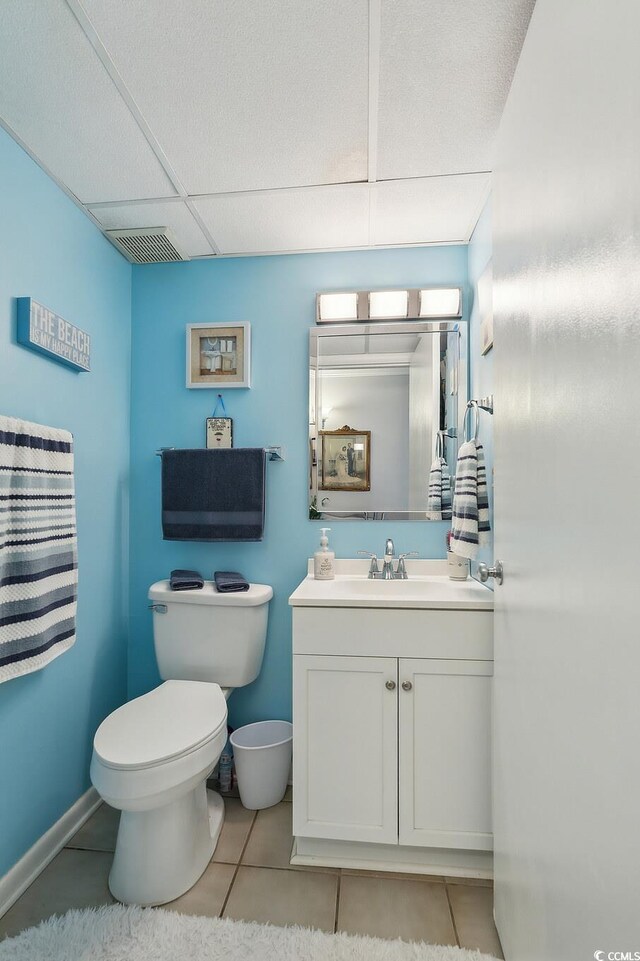 1210 N Waccamaw Dr Unit 1105, Murrells Inlet, SC 29576 - bathroom with toilet, tile patterned flooring, vanity, and a drop ceiling