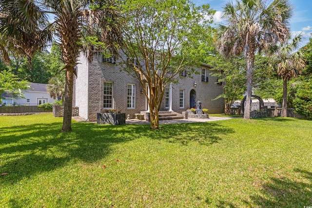 1140 Waterway Ln, Myrtle Beach, SC 29572 - back of house with a patio area and brick siding
