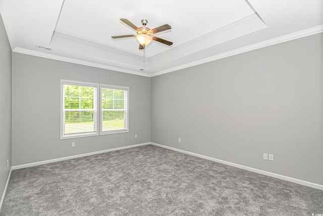 3539 Harrelson Ave, Loris, SC 29569 - unfurnished room featuring a raised ceiling, a ceiling fan, ornamental molding, carpet, and baseboards