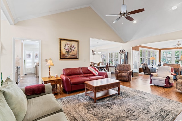 2567 Lake Vista Dr, Little River, SC 29566 - living room featuring ceiling fan, ornamental molding, recessed lighting, wood finished floors, and high vaulted ceiling