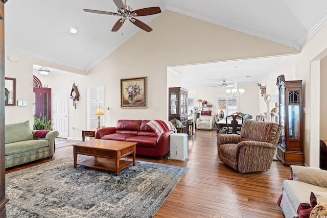 2567 Lake Vista Dr, Little River, SC 29566 - living room featuring a ceiling fan, ornamental molding, wood finished floors, high vaulted ceiling, and a chandelier