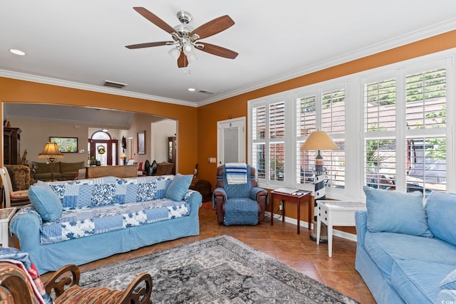 2567 Lake Vista Dr, Little River, SC 29566 - living room featuring healthy amount of natural light, ornamental molding, arched walkways, tile patterned flooring, and ceiling fan