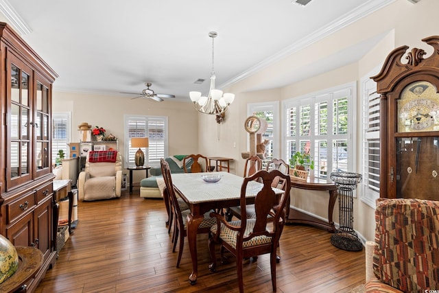 2567 Lake Vista Dr, Little River, SC 29566 - dining space with crown molding, a chandelier, dark wood-style flooring, and ceiling fan
