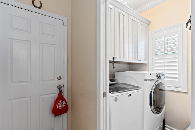2567 Lake Vista Dr, Little River, SC 29566 - laundry area with separate washer and dryer, cabinet space, and crown molding