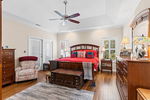 2567 Lake Vista Dr, Little River, SC 29566 - bedroom featuring hardwood / wood-style flooring, recessed lighting, ornamental molding, a raised ceiling, and ceiling fan
