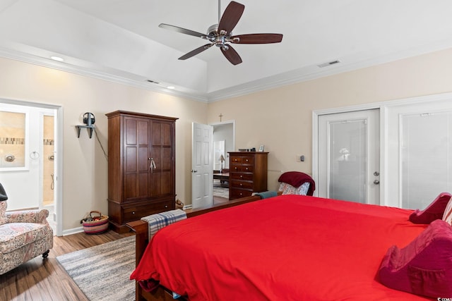 2567 Lake Vista Dr, Little River, SC 29566 - bedroom with wood finished floors, ornamental molding, a ceiling fan, baseboards, and connected bathroom