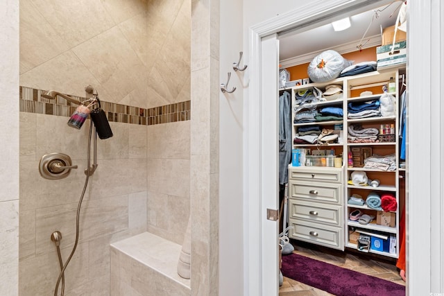 2567 Lake Vista Dr, Little River, SC 29566 - bathroom with a tile shower and a spacious closet