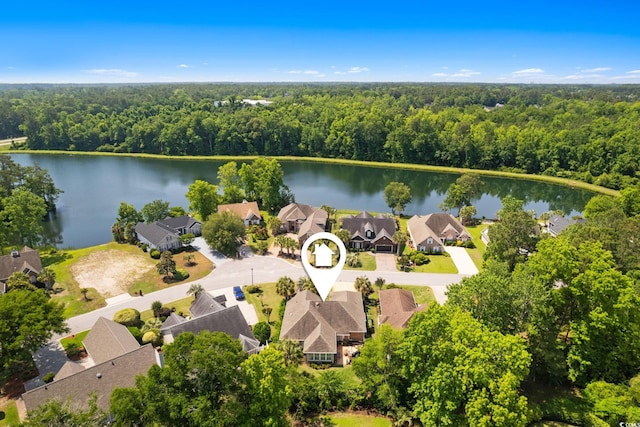 2567 Lake Vista Dr, Little River, SC 29566 - aerial view of residential area with a heavily wooded area and a large body of water