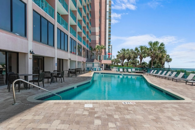 2207 S Ocean Blvd Unit 1517, Myrtle Beach, SC 29577 - community pool featuring a patio area