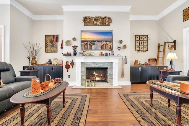 81 Cascade Dr, Murrells Inlet, SC 29576 - living room with a premium fireplace, ornamental molding, and wood finished floors