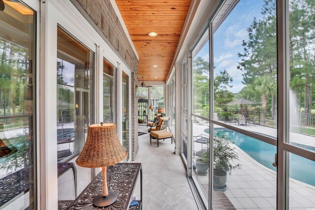 81 Cascade Dr, Murrells Inlet, SC 29576 - sunroom featuring wooden ceiling, recessed lighting, and tile patterned floors