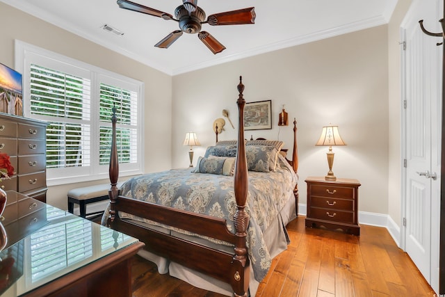 81 Cascade Dr, Murrells Inlet, SC 29576 - bedroom featuring wood-type flooring, ornamental molding, baseboards, and ceiling fan