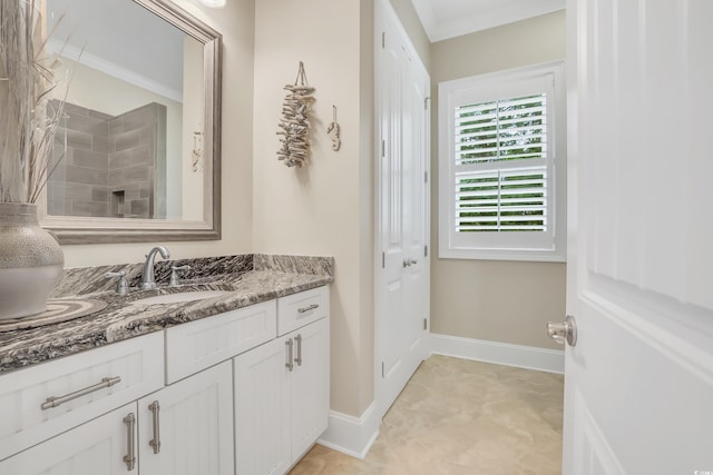 81 Cascade Dr, Murrells Inlet, SC 29576 - bathroom featuring vanity, baseboards, a tile shower, and crown molding