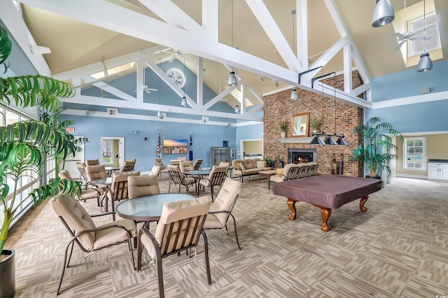 81 Cascade Dr, Murrells Inlet, SC 29576 - game room with high vaulted ceiling, pool table, a brick fireplace, carpet, and beamed ceiling