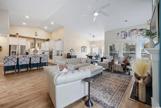 2300 Lark Sparrow St, Myrtle Beach, SC 29577 - living room with high vaulted ceiling, light wood-type flooring, ceiling fan, and recessed lighting