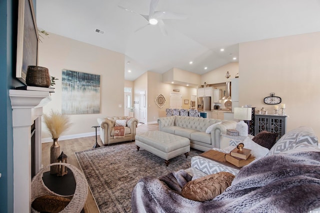 2300 Lark Sparrow St, Myrtle Beach, SC 29577 - living area with vaulted ceiling, a ceiling fan, light wood finished floors, recessed lighting, and baseboards