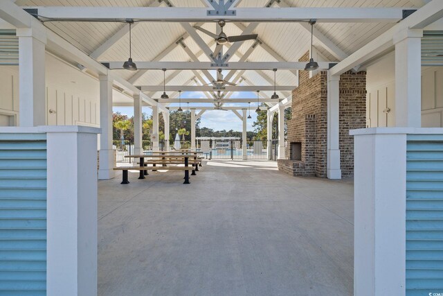 2300 Lark Sparrow St, Myrtle Beach, SC 29577 - view of patio featuring a ceiling fan, a gazebo, and an outdoor fireplace