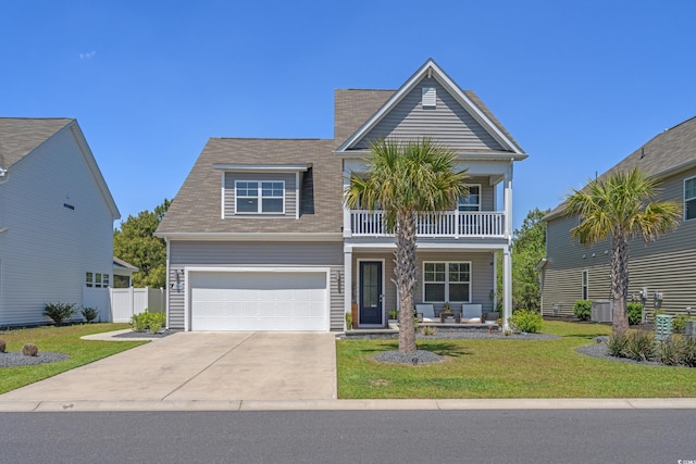 1168 Baker Creek Loop, Myrtle Beach, SC 29579 - view of front of property with a porch, a balcony, an attached garage, concrete driveway, and central AC unit