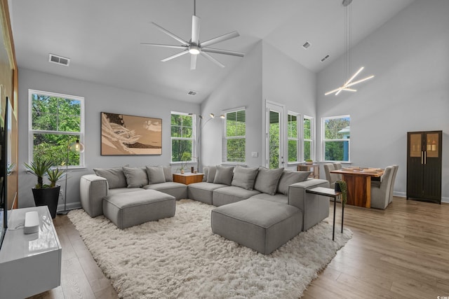 1168 Baker Creek Loop, Myrtle Beach, SC 29579 - living area with wood-type flooring, a ceiling fan, high vaulted ceiling, and baseboards