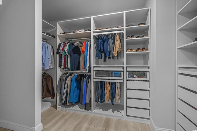 1168 Baker Creek Loop, Myrtle Beach, SC 29579 - walk in closet with wood finished floors