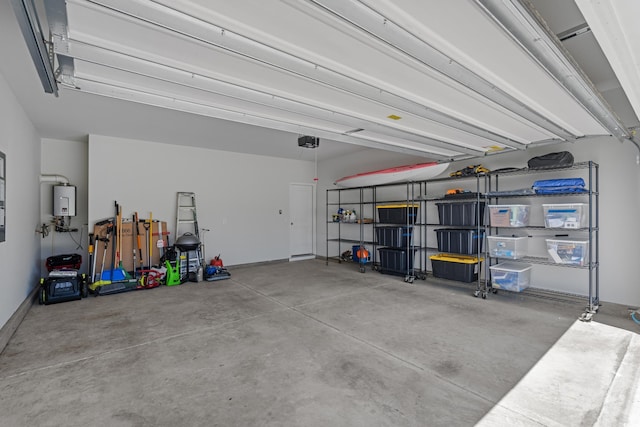 1168 Baker Creek Loop, Myrtle Beach, SC 29579 - garage featuring water heater and a garage door opener