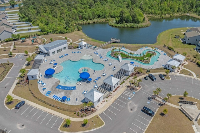 1168 Baker Creek Loop, Myrtle Beach, SC 29579 - drone / aerial view of a pool area, a large body of water, and a forest