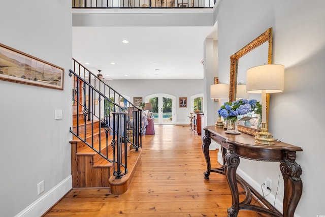 2382 Waverly Rd, Pawleys Island, SC 29585 - entrance foyer with stairway, light wood-type flooring, baseboards, french doors, and recessed lighting