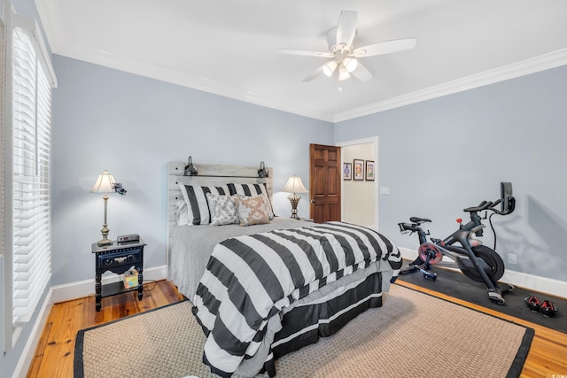 2382 Waverly Rd, Pawleys Island, SC 29585 - bedroom with crown molding, baseboards, wood finished floors, and ceiling fan