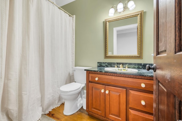 2382 Waverly Rd, Pawleys Island, SC 29585 - full bath with toilet, vanity, and wood finished floors