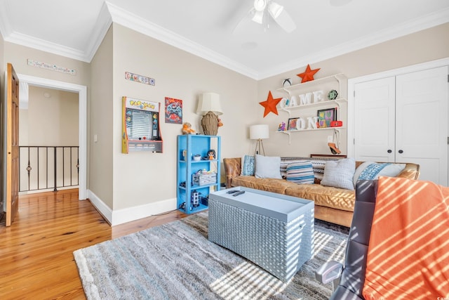 2382 Waverly Rd, Pawleys Island, SC 29585 - living area featuring ornamental molding, light wood-style floors, baseboards, and ceiling fan