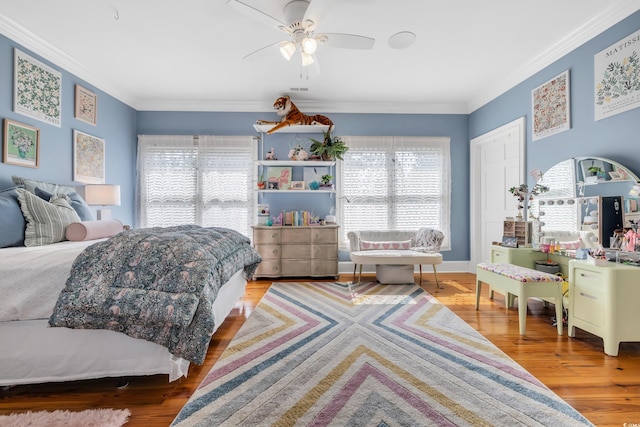 2382 Waverly Rd, Pawleys Island, SC 29585 - bedroom with wood finished floors, ornamental molding, and ceiling fan