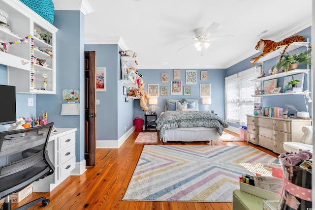 2382 Waverly Rd, Pawleys Island, SC 29585 - bedroom with crown molding, light wood-style flooring, baseboards, and a ceiling fan