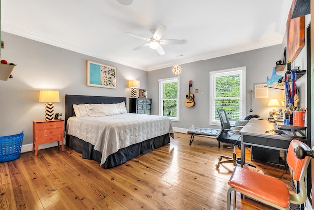 2382 Waverly Rd, Pawleys Island, SC 29585 - bedroom featuring crown molding, light wood-style flooring, baseboards, and ceiling fan
