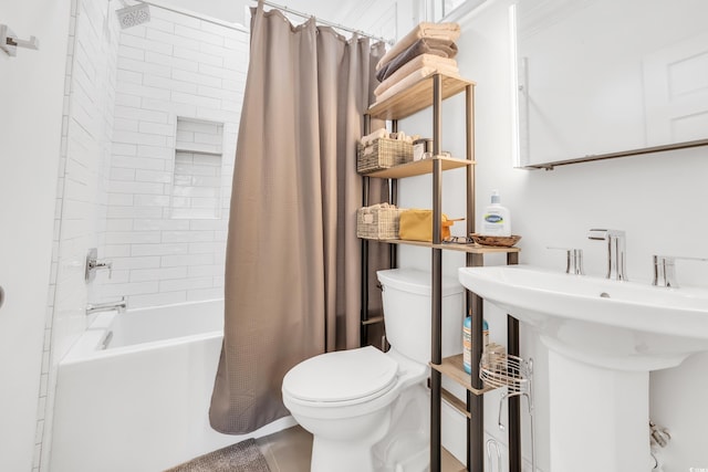 2382 Waverly Rd, Pawleys Island, SC 29585 - bathroom featuring toilet, shower / bath combo with shower curtain, and a sink
