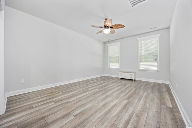 2475 Blue Crane Cir Unit 106, Myrtle Beach, SC 29577 - unfurnished room with ceiling fan, light wood-style flooring, and baseboards