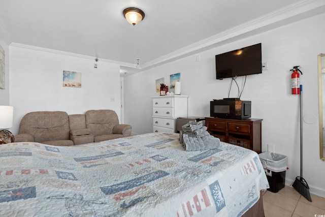 5409 N Ocean Blvd Unit 106/7 108, North Myrtle Beach, SC 29582 - bedroom featuring light tile patterned flooring, crown molding, and baseboards