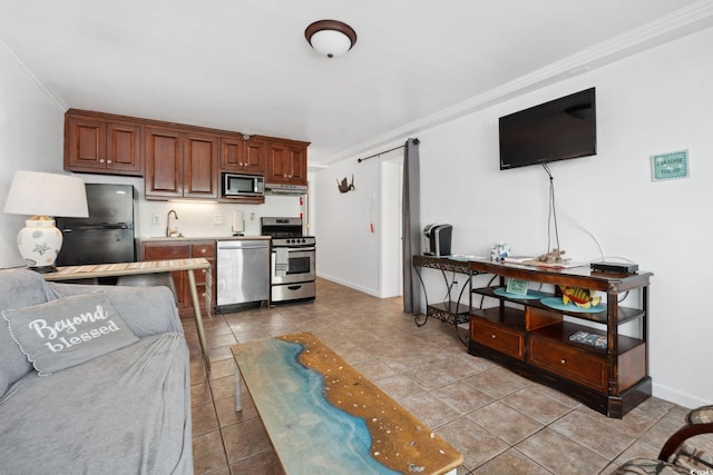 5409 N Ocean Blvd Unit 106/7 108, North Myrtle Beach, SC 29582 - living room featuring ornamental molding, light tile patterned flooring, and baseboards