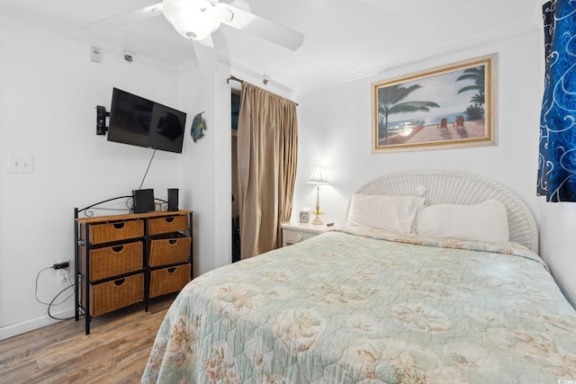 5409 N Ocean Blvd Unit 106/7 108, North Myrtle Beach, SC 29582 - bedroom featuring crown molding, wood finished floors, baseboards, and a ceiling fan