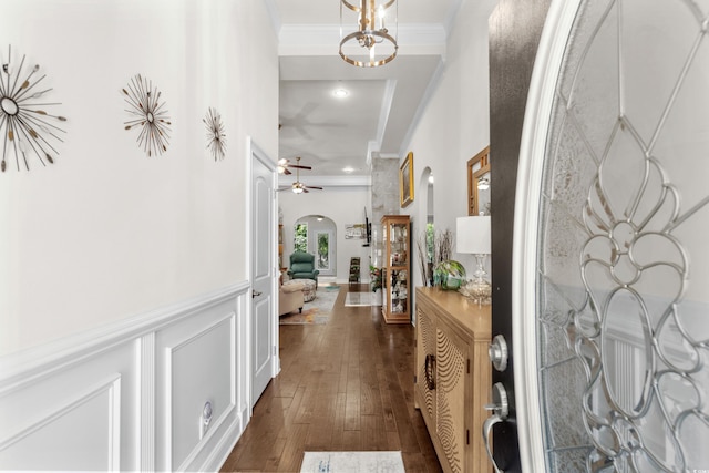 2318 Via Palma Dr, North Myrtle Beach, SC 29582 - entryway with crown molding, arched walkways, ceiling fan, dark wood-style floors, and a wainscoted wall