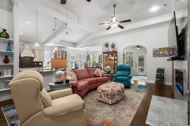 2318 Via Palma Dr, North Myrtle Beach, SC 29582 - living area with ceiling fan, ornamental molding, dark wood-style flooring, a high end fireplace, and recessed lighting