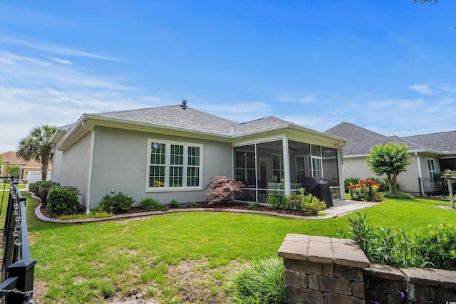 2318 Via Palma Dr, North Myrtle Beach, SC 29582 - rear view of house with stucco siding and a sunroom